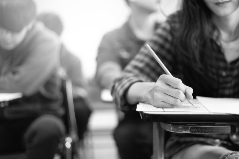 Students taking a test in hopes to be NCAA Eligibility